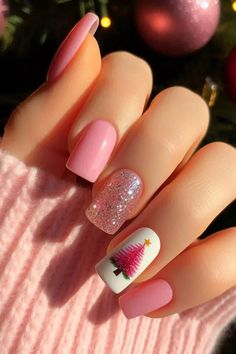 This Christmas, pink is making a splash as a standout fashion trend, and your nails are no exception! Embrace the holiday spirit with one of these 21 stylish pink Christmas nail designs. Gold, white, cute, short, simple, red, girly, silver, easy, classy, snowflake, bow, long, subtle, santa hat, and white, and red, glitter, and gold, and white glitter, and green, almond, and silver, and blue. Christmas Nail Trends, Pink Christmas Nail, Holiday Nails Christmas, Christmas Pink, Nail Swag