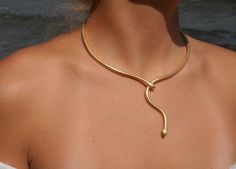 Model : SnakeTie Necklace Collection: Ofis BRASS / gold-plated with lustrous effect Handcrafted 100% in Greece Adjustable size - open from behind for your convenience This item's measurements are (Approximately): Width 13.2 cm / 5.2 in Width of Opening 7.7 cm / 3.0 in Circumference 30.5  cm / 12.0in (not included the width of opening) ++ IN STOCK AVAILABLE FOR IMMEDIATE SHIPMENT:  4 pcs GOLD-PLATED                                                                                                  1 pcs ROSEGOLD-PLATED ++ Dear All, Please note that we partnered with FedEx Couriers for all orders from USA. Therefore, when ordering please inform us at NOTES section or via email a valid contact number and email address. Beautiful handmade jewelry - piece of art - one of a kind  The design can als Tie Necklace, Snake Jewelry, Handmade Brass, Jewelry Inspo, Jewelry Diy, Piercing Jewelry, Cute Jewelry, Body Jewelry, Jewelry Inspiration