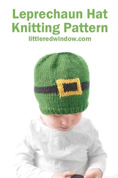 a baby wearing a green hat and holding a camera with text overlay that reads leprechaun hat knitting pattern