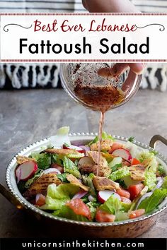 a person pouring dressing into a salad in a bowl