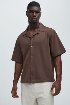 Available In Brown, White and Sage Fold Down Collar Front Button Closure Textured Detail Short Sleeve 95% Polyester, 5% Spandex Imported | Mens Koa Textured Shirt in Brown size 3XL by Fashion Nova Casual Brown Top With Johnny Collar, Casual Brown Johnny Collar Top, Classic Brown Top With Camp Collar, Brown Short Sleeve Shirt Outfit Men, Brown Spread Collar Top With Button Closure, Cheap Brown Men's Shirt, Brown Camp Collar Top With Button Closure, Brown Button-up Short Sleeve Shirt, Brown Button-up Camp Shirt