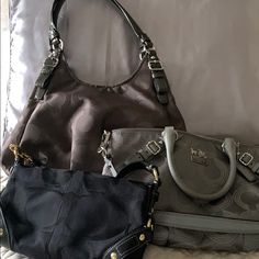 Coach Three Bag Bundle For $200 Or If Purchased Separately: 1. Gray Hobo Bag New Never Used No Tags, $100 2. Black And Gold Shoulder Bag, Like New No Wear And Tear Used A Few Times $60 3. Gray Speedy Bag With Shoulder Strap, Minor Scratches On Hardware $70 All Bags Are In Impeccable Condition And Come From A Smoke Free Home. Designer Gray Bags, Designer Gray Bag With Branded Hardware, Gray Bag With Branded Hardware For Daily Use, Gray Shoulder Bag With Branded Hardware, Gray Shoulder Bag With Branded Hardware For Everyday, Coach Gray Shopping Bags, Gray Coach Satchel Bag, Chic Gray Coach Bag, Gold Shoulder Bag