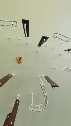 a group of metal objects floating in the air