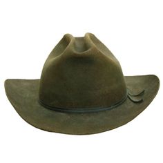 A stylish Sheplers Hat in a rich green hue, accompanied by a sleek vinyl hat container. The container, measuring 15 inches in diameter and 9 inches in height, is the perfect safekeeping for this fashionable accessory. The hat itself boasts dimensions of 12 inches in width, 14 inches in depth, and 6 inches in height. Western Green Hat For Country Events, Green Short Brim Hat Bands For Rodeo, Green Hat Bands For Rodeo With Short Brim, Vintage Wide Brim Travel Hat, Green Fedora Hat For Rodeo, Green Wide Brim Western Hat, Vintage Green Hat With Short Brim, Green Wide Brim Travel Hat, Vintage Curved Brim Hat For Travel