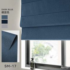 a blue roman blind in front of a window with the words dark blue on it