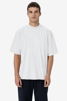 This one-of-a-kind t-shirt is made with comfort in mind. This style features a large sleeve, super high mock neck, and boxy, wide fit around the body. Made of our classic 18 singles open-end jersey, just like the essential 1801GD. Wear with jeans, sweats, or bike shorts for a perfectly oversized look. We recommend ordering 1 size up from your usual size. Garment dyed and enzyme washed for shrink-free, worn-in finish. This item is a garment dye product. Garment dye items can be distinguished by ‚ Taylor R, Off Black, Staple Pieces, Bike Shorts, Cotton Style, High Waist Jeans, Black Tee, Mock Neck, Shirt Style