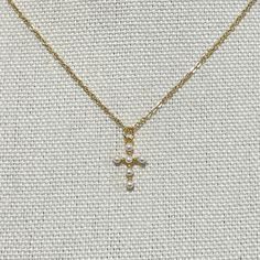 Small Pearl Cross Pendant on Dainty Chain Necklace, Gift for Her, Christian Baptism Necklace Item details ✰ Color: gold, silver ✰ Finish: matte finish 14K gold/ silver plated pendant ✰ 10mm x 15mm pendant  ✰ Shimmering high quality 15-19" chain length ✰ High quality clasp to finish  ✰ Comes in a cute gift box, perfect for gift-giving! Yellow Gold Cross Necklace For First Communion, Dainty White Jewelry For Baptism, Gold Cross Pendant Necklace For First Communion, Gold Cross Jewelry For Confirmation, Dainty Cross Pendant Necklace For Baptism, Dainty Gold Cross Necklace For Baptism, Gold Cross Pendant Necklace For Baptism, White Cross Pendant Necklace For Baptism, White Cross Necklace For Baptism