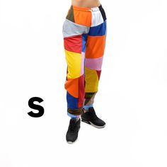 We offer a unique and colorful patchwork design pants. The colors of each model are unique and not repeatable. Add stylish and vibrant notes to your look. This demi-season clothes is made of the highest quality cotton fabric, very comfortable and pleasant to the touch. The pants are very comfortable and do not restrict movement, suitable for home, jogging, yoga, walking in the fresh air. If you like bright and unusual things, then this sweatpants will be a great choice for you or for those to wh Stretch Cotton Color Block Bottoms, Stretch Cotton Bottoms With Color Block, Multicolor Patchwork Relaxed Fit Bottoms, Sporty Multicolor Loungewear Bottoms, Sporty Multicolor Long Pants, Casual Multicolor Patchwork Pants, Multicolor Relaxed Fit Athleisure Bottoms, Trendy Multicolor Color Block Bottoms, Sporty Multicolor Bottoms With Relaxed Fit