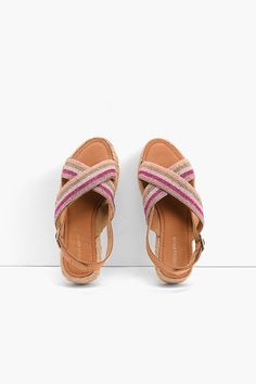 Experience a perfect combination of style and comfort with these chic Pink Stripes Beaded Flatform Sandals. Crafted from luxurious leather, these sandals are designed with a crossover straps and a buckle-fastening back strap for a secure fit. The open toe sandal is embellished with beaded stripes for a stylish look. The flatform sole ensures a comfortable walk, making them ideal for everyday wear. These beautifully handcrafted sandals are sure to become your go-to summer style. From maxis to jum Chic Cross Strap Sandals For Vacation, Beach Sandals With Strap And Open Heel, Strap Sandals With Open Heel For Beach, Slingback Sandals With Strap For Beach, Open Heel Slingback Sandals For Beach With Strap, Summer Sandals With Heel And Cross Straps, Summer Sandals With Heel Strap And Cross Strap, Summer Cross Strap Slingback Sandals With Buckle, Summer Cross Strap Slingback Sandals With Buckle Closure