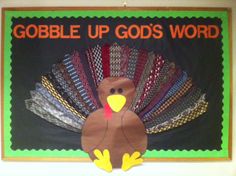 a bulletin board with a turkey on it that says gobble up god's word