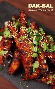 chicken wings with sesame seeds and green onions