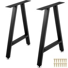 pair of black metal bar stools with wheels