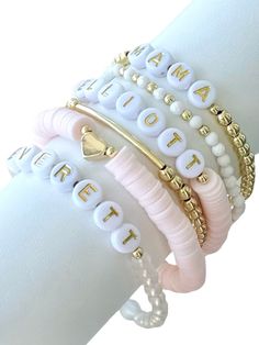 Fun, feminine stretchy name, initial or word bracelets make the perfect outfit accessory! Mix and match the beautiful light pink word bracelets with our accent bracelets for a pop of gold to dress up your bracelet stack.   Each bracelet sold separately ** 👉🏻Bracelets are made with high quality hypoallergenic 18k gold filled spacer beads, heishi beads, and brass beads 📌INSTRUCTIONS: 1. From the Dropdown Menu: >> * SELECT appropriate "Bracelet Length" **Please see photo provided for wrist measurement instructions. Each bracelet is custom made to size. If ordering as a gift, please measure your own wrist and give best educated guess. (Average wrist size is between 6.5-6.75" for reference.) If you have any questions about sizing, please message seller. >> * SELECT from "Bracelet Style" 2. I Dainty White Charm Bracelet For Mother's Day, Trendy White Jewelry For Personalized Gift, Dainty White Name Bracelet For Everyday, Trendy White Charm Bracelet With Letter Beads, White Charm Bracelet For Everyday And Mother's Day, Dainty White Bracelets For Mother's Day, Dainty White Stretch Bracelet As Gift, Pink Letter Beads Name Bracelet, White Hypoallergenic Dainty Name Bracelet