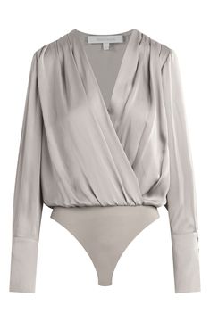 A glossy bodysuit boasts a deeply dipped neckline and artfully tailored cuffs for a sleek add-in to your date-night look. Surplice V-neck with hidden-snap closure Long sleeves with two-button cuffs Partially lined 100% polyester with 94% polyester, 6% spandex contrast Dry clean or hand wash, dry flat Imported Women's Clothing Classic Long Sleeve Bodysuit For Work, Elegant Fall Bodysuit For Workwear, Chic Fall Bodysuit For Workwear, Evening V-neck Bodysuit For Fall, Chic Fall Workwear Bodysuit, Chic Long Sleeve Bodysuit For Night Out, Elegant Long Sleeve Bodysuit For Night Out, Elegant Fitted Bodysuit For Date Night, Elegant Bodysuit For Date Night