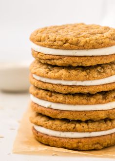 a stack of cookies with white frosting on top