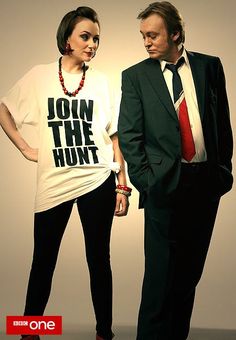 a man and woman standing next to each other in front of a white background with the words join the hunt on it