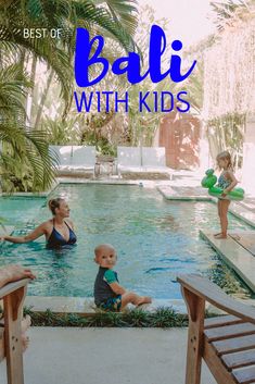 a woman and two children in a pool with the words bali with kids