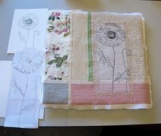 some papers are laying on top of each other with flowers and leaves drawn on them