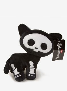 a small black and white stuffed animal