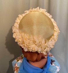 "This is a lovely, vintage hat from the 50s or early 60s. No labels or tags. No size tags. It measures 21\" around the inside. It is made of a stiff, sunny yellow form. The edge has a wide border of yellow fabric flowers, all around. The very edge of the hat is yellow velvet. The hat is in good, vintage condition. No damage or other issues. Small pin dot spot on top. No other soil or wear. So chic!" Vintage Cream Fascinator For Royal Ascot, Cream Vintage Fascinator For Royal Ascot, Vintage Cream Wide Brim Fascinator, Vintage Wide Brim Cream Fascinator, Vintage Beige Summer Fascinator, Beige Vintage Fascinator For Royal Ascot, Cream Wide Brim Vintage Fascinator, Vintage Summer Fascinator For Garden Party, Vintage Yellow Hat With Curved Brim