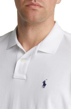 The label's iconic embroidered logo adds charm to a short-sleeve polo crafted from airy cotton piqué for comfort during your days off. 27 1/2" length (size Medium) Rib collar Short sleeves with rib cuffs 100% cotton Machine wash, tumble dry Imported Ralph Lauren Cotton Sporty Polo Shirt, Moisture-wicking Cotton Collared Polo Shirt, Classic Polo Collar Cotton T-shirt, Ralph Lauren Summer Polo Collar T-shirt, Ralph Lauren Short Sleeve Logo T-shirt, Short Sleeve Polo, Polo Ralph, Polo Ralph Lauren, Ralph Lauren