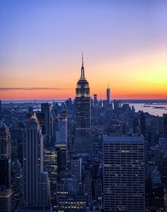 the empire building in new york city at sunset