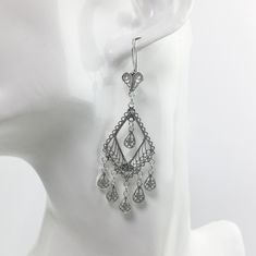 Handmade 925 Sterling Silver Artisan Crafted Filigree Rhombus Chandelier Earrings  Material: 925 Solid Sterling Silver, 925 Stamped Earrings Length: 2.75 inches Earrings Width: 0.85 inch Closure: Ear wire with safety catch Finishing: Oxidized and Polished Comes with a gift pouch and box. Free Domestic Shipping We hope that you enjoy our exclusive artisan handcrafted jewelry. Handmade Elegant Diamond-shaped Earrings, Sterling Silver Filigree Dangle Chandelier Earrings, Silver Diamond-shaped Earrings, Handmade Elegant Diamond-shaped Jewelry, Silver Dangle Chandelier Earrings With Intricate Design, Sterling Silver Diamond-shaped Wedding Earrings, Silver Handmade Drop Chandelier Earrings, Handmade Silver Drop Chandelier Earrings, Statement Chandelier