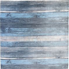 an old wooden plank wall with blue and white paint