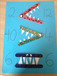 a blue paper board with different types of teeth on it