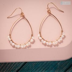 Teardrop outline Earrings with freshwater pearl accent It makes a great everyday earrings. Or, if you are thinking of getting a thoughtful gift for your bridesmaids, this earrings is it! They can wear it during your wedding and also after that. Definitely a bridesmaid gift that will be appreciated and enjoyed for a long long time. Measurements: Approximate Length: 2 **Important: Unless otherwise noted, all of the findings (ear wires, chains, etc.), framed gems, and charms in the jewelry is plate Raw Quartz Necklace, Hoop Dangle Earrings, Earrings Bridesmaid, Freshwater Pearls Earrings, Pearl Hoop Earrings, Earrings Dainty, Earrings Statement, Everyday Earrings, Dainty Earrings