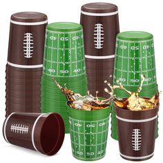 green and brown cups with footballs on them