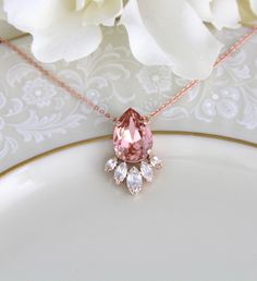 Rose gold Bridal necklace, Crystal Wedding necklace, Bridal jewelry, Blush crystal necklace, Swarovski necklace, Simple necklace, Bridesmaid - Handmade to order with CRYSTALLIZED™ - Swarovski Elements - Swarovski vintage rose and clear stones - Rose gold plated brass - Available in other finishes and Swarovski crystals upon request - Pendant measures 1-1/8 inch x 7/8 inch - Please choose your length from drop down menu - Each piece is gift wrapped Matching earrings: https://www.etsy.com/listing/ Elegant Rose Gold Crystal Necklace For Wedding, Rose Gold Crystal Necklaces For Wedding, Elegant Pink Crystal Necklaces For Weddings, Rose Gold Crystal Bridal Necklace Gift, Rose Gold Crystal Bridal Necklace, Pink Crystal Wedding Necklaces, Pink Crystal Wedding Necklace, Wedding Necklace With Teardrop Pendant And Jewels, Gold Pendant Crystal Necklace For Wedding