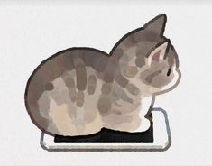 a cat laying on top of a mouse pad