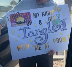 a person holding up a sign that says, i don't do my night and get tangled with me at prom?