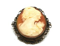 (eBay) Find many great new & used options and get the best deals for Vintage 800 Silver Carved Helmut Shell Woman Profile Cameo Brooch Pendant at the best online prices at eBay! Free shipping for many products! Handmade Antique Brooches For Formal Occasions, Antique Handmade Brooches For Formal Occasions, Vintage Carved Collectible Brooches, Vintage Carved Brooches Gift, Vintage Carved Brooches For Gifts, Vintage Oval Brooches For Collectors, Antique Carved Brooches For Formal Occasions, Female Profile, Cameo Brooch