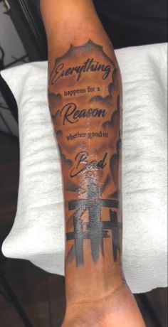 a person with a tattoo on their arm that says, everything happens for a reason