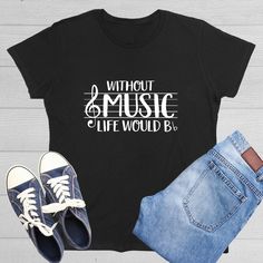 Without Music Life Would B Flat Shirtt Hilarious Harmonies for the Humorous Music Lover Teacher gift Orchestra Singer Pianist T-Shirt Road Kill T shirts has a line of exceptionally funny t shirts that are perfect for those who are looking for edgy novelty T shirts to wear. If you are the type of person who likes to wear a graphic black tee with a funny quote or a witty comment, then these funny T shirts are perfect for you! Amazing Variety Finding comical graphic tees for women can be a challenge at times because some online stores only sell funny mens shirts. Here at Roadkill T Shirts, it's altogether a different story! Our shirts come in all shapes and sizes, expanding the typical size chart of small, medium large to include sizes such as 5XL. Not only do you have access to heavy duty co Music-themed Slogan Tops For Concerts, Music-themed Slogan T-shirt For Concert, Music-themed Concert T-shirt With Slogan, Music-themed Slogan Tops With Crew Neck, Music-themed Slogan Top With Crew Neck, Music-themed Slogan Crew Neck Top, Music-themed Cotton Tops With Slogan, Music-themed Cotton Slogan Tops, Novelty T Shirts