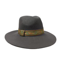 A stunning hat! Paisley band. 4" wide brim. Elastic drawstring in satin band inside. C-crown, slight pinch. One size fits most. 100% wool felt. Felt Fedora, Fedora Hat, Wide Brimmed, Wool Felt, Fedora, Paisley, Felt, Satin, Elastic