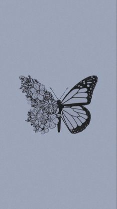 a black and white photo of a butterfly with flowers in it's back end