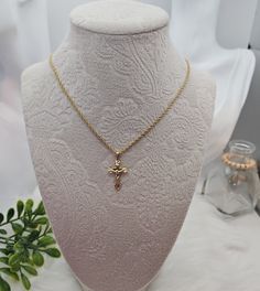 Gold Small Crucifix Necklace, 1mm French Rope Chain, 14k Heavy Plated Gold, Unisex Crucifix Necklace, 14k Heavy Plated Gold, Small Cross Necklace  High Quality Necklace, Lifetime Replacement Guarantee.  French Rope Chain is 1mm thick, pendant is approximately 20mm high and 15mm in width. E X P E D I T E D ∙ S H I P P I N G You will be able to choose faster shipping options when you add Priority Shipping upon checkout. Ship times do NOT include production times. However, if you select expedited shipping, we will try to get your order completed faster. We want you to be happy with your purchase, and we take pride in offering you well-made, quality products. If you have any questions or issues with an order, please don't hesitate to contact us! We look forward to messages you send us and welc Yellow Gold Cross Charm Necklace With Adjustable Chain, Dainty Gold Crucifix Jewelry, Gold Cross Figaro Chain Necklace, Gold Figaro Chain Cross Necklace, Gold Figaro Chain Necklace With Cross Pendant, Gold Figaro Chain Necklace With Cross Shape, Gold Cross Necklace With Figaro Chain For Gift, Gold Cross Necklace With Curb Chain, Gold Crucifix Necklace With Delicate Chain