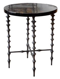 a black table with metal spikes on it