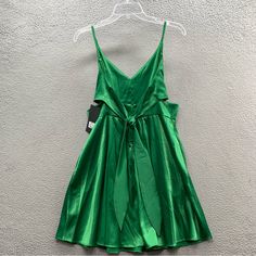 Akira Classy Looks Nwt Women’s Satin Sleeveless Slip Mini Dress Tie Waist Dark Green Size Xl Cut Out Sides New With Tags Sleeveless Party Sundress With Tie Back, Sleeveless Tie Back Sundress For Party, Sleeveless Sundress With Tie Back For Party, Sleeveless Green Satin Dress, Green Sleeveless Sundress For Party, Green Sleeveless Mini Dress For Date Night, Green Satin Sleeveless Dress For Spring, Tie-back Sleeveless Dress For Date Night, Casual Sleeveless Satin Dress