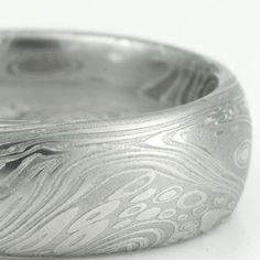 One of my favorite Damascus patterns!  Damascus Steel Mens Wedding Band 8mm.  Mokume Gane at its best! Modern Engraved Jewelry For Wedding, Modern Etched Jewelry For Wedding, Silver Wedding Rings With Engraving Option, Elegant Wedding Rings With Brushed Finish, Modern Silver Engraved Wedding Ring, Modern Engraved Wedding Ring With Engraving Option, Silver Wedding Rings With Brushed Finish, Damascus Jewelry, Damascus Patterns