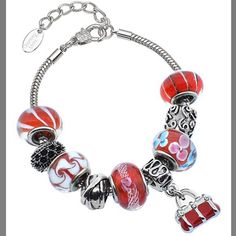 Beautiful Charm Bracelet Features Red And White Murano Glass Beads, Rhodium Plated Stainless Steel Carved Charm Beads, And The Beautiful Red Purse Dangling Charm. The Bracelet Is A Sleek Snake Stain Which Is Also Made Of Rhodium Plated Stainless Steel. It Is Approximately 7 Inches Long With A 1.5 Inch Extender. There Is A Lobster Claw Clasp. Red Metal Crystal Bracelet Gift, Red Metal Jewelry With Colorful Beads, Gift Red Beaded Bracelets With Silver Beads, Elegant Red Beaded Bracelets With Spacer Beads, Red Beaded Charm Bracelet For Jewelry Making, Red Beaded Bracelets With Silver Beads For Gifts, Elegant Silver Beaded Bracelets With Colorful Beads, Metal Silver Beads For Gifts, Elegant Red And Silver Beads