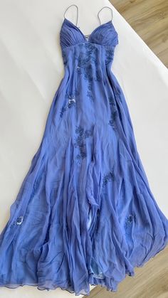 Be the belle of the ball in our stunning Blue Long Prom Dress. Made with lightweight chiffon for effortless movement, this dress features delicate appliques that add just the right amount of glamour. The sheath silhouette flatters your figure, making it perfect for any formal occasion. Dress DetailStyle: SheathFabric: ChiffonColor: Blue, PurpleLength: LongNeckline: V-neckSleeves: Sleeveless Prom Dress Inspo, Mode Hippie, Spaghetti Strap Prom Dress, Long Prom Dresses, Grad Dresses