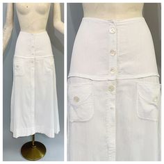 "Very special antique ribbed white cotton skirt circa 1900s to early 1920s. I've seen these referred to as both tennis and walking skirts. The skirt has pearly buttons but actually fastens with little snaps and also has front pockets. Excellent vintage condition. There is an area of very faint discoloration on the front bottom as shown in the close-up photo. Measurements: Waist - 24\" Hips - 35\" Length - 35\"" Walking Skirt, White Cotton Skirt, 1910s Fashion, Charlottesville Va, Flapper Style, Gray Silk, Edwardian Fashion, Front Bottoms, Brown Coat