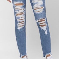 These Cello Jeans Have A Basic Straight Legged Fit But Slightly Taper At The Ankle With Fun Distressing On The Front In A Medium Wash Color And A Frayed Hemline. These Jeans Have Slight Stretch And Will Be Great To Wear Year Round Whether With Your Sandals Or Booties. 1/3/5/7 Blue Denim Jeans With Holes, Spring Denim Jeans With Holes, Blue Jeans With Holes For Spring, Spring Medium Wash Bottoms With Holes, Shorts Sweatpants, Jeans Pants, High Jeans, Colored Jeans, Jean Shorts