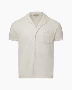 Ideal for bringing along on balmy vacations, our button-down Terry Camp Shirt is inspired by the look of classic cabana styles. It’s tailored in ultra-soft cotton toweling with short sleeves, a patch pocket, and side slits at the hem. Classic cabana style Short sleeves Patch pocket Side slits at the hem True to size. Summer Camp Shirt With Placket And Lapel Collar, Classic Camp Collar Tops For Beach, Classic Beach Tops With Camp Collar, Classic Button-up Camp Shirt For Beach, Classic Beach Camp Shirt Button-up, Classic Camp Collar Shirt For Beach, Classic Short Sleeve Shirt With Button Closure For Vacation, Classic Collared Shirt For Vacation, Summer Cotton Camp Shirt With Polo Collar