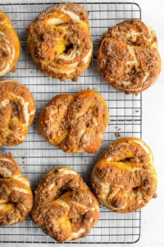 freshly baked cinnamon rolls on a cooling rack