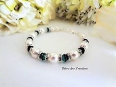 Sharing for Debra Becker on Etsy  Really love this, from the Etsy shop DebraAnnCreations. https://etsy.me/3jL6YqD #etsy #crystalbracelet #swarovskibracelet #pearlbracelet #bridalbracelet #emeraldjewelry #emeraldwedding #bridebracelet #bridesmaidbracelet Elegant Beaded Jewelry For Birthday, Elegant Beaded Jewelry For Birthdays, Elegant Green Bracelet For Birthday, Elegant White Bracelets For Birthday, Green Jewelry For Mother's Day Wedding, Elegant White Bracelet For Birthday, Green Jewelry For Wedding And Mother's Day, Green Wedding Jewelry For Mother's Day, Emerald Wedding Jewelry